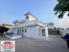 Two-story villa with ten rooms and kitchens in Al Nakheelat