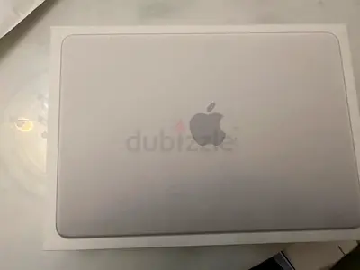 Apple Macbook NEO 8gb 512gb silver TDRA open box brand new condition 2750 AED.