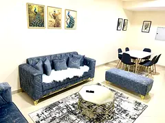 For monthly rent: one bedroom, living room, balcony, and two bathrooms in Al Taawun, Sharjah