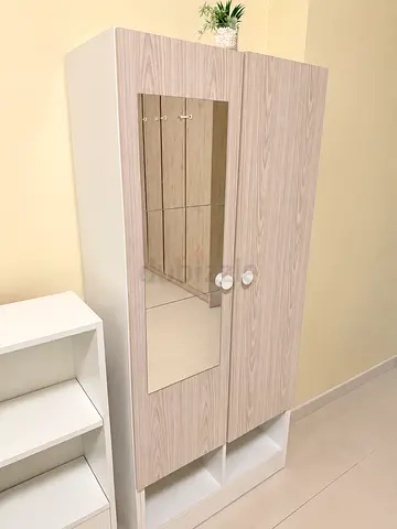 Light wood wardrobe with mirror and storage cubbies - good condition