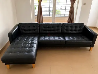 IKEA Black L-shaped Leather Sofa with Chaise - Good Condition