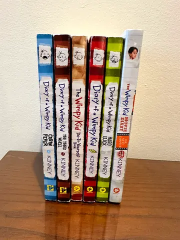 Diary of a Wimpy Kid book set - multiple paperback volumes, one for 20aed