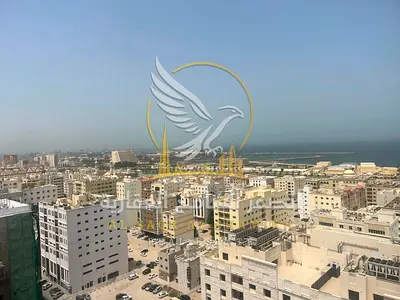 Two bedroom apartment in Al Butinah for annual rent Spacious with built in wardrobes Master bedrooms Side sea view Modern finishes in a family