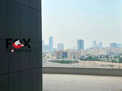 Annual 1BHK for rent in City Tower, opposite Grand Mall, near Safeer Mall. 2 bathrooms, open balcony, AED 27,000 yearly, 4 payments, security cheque.