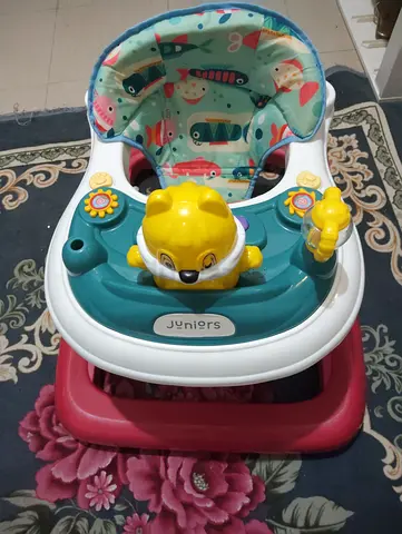 Never Used baby walker with toy tray - brand new