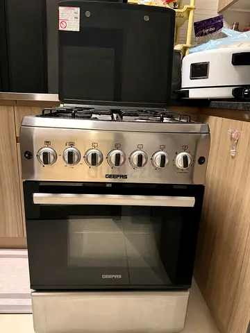 Geepas 4-burner Gas Cooker with Oven - Stainless Steel, Good Condition