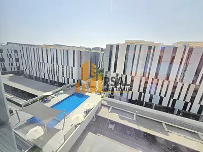 Modren 1BR Appartment In Riff Aljada Community pool view