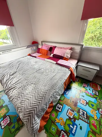 Single bed with bedside drawer and kids play rug - good condition