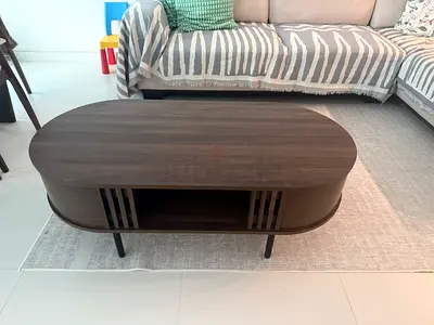Dark Wood Oval Coffee Table with Open Shelf