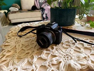 Canon EOS DSLR with 50mm lens (body + prime lens) - good condition