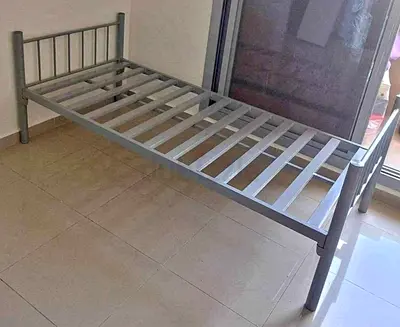Used iron single bed noor
