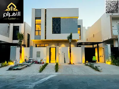 A luxurious villa including electricity, water, and central air conditioning, located directly opposite a mosque and on a main street, with modern des