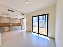 Middle Unit | Landscaped | Unfurnished
