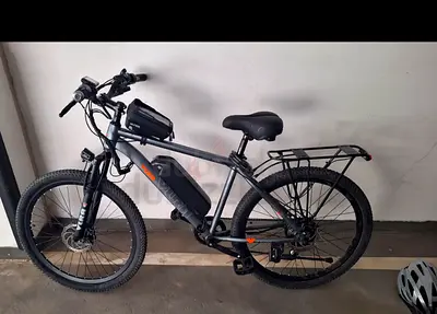 Used Electric Mountain Bike with Rear Rack and Removable Battery
