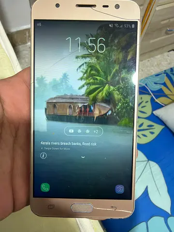 Samsung Galaxy J7 (gold) - used, screen has minor crack & Redmi A1 used, screen minor crack
