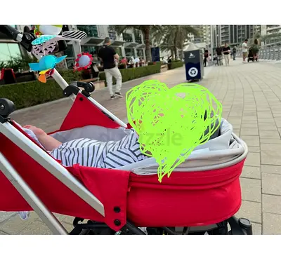 Red bassinet stroller - used, good condition