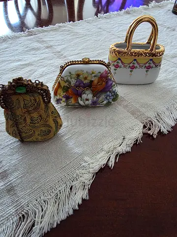 Beautiful collection of three vintage decorative purse trinket boxes, estimated to be over 50 years