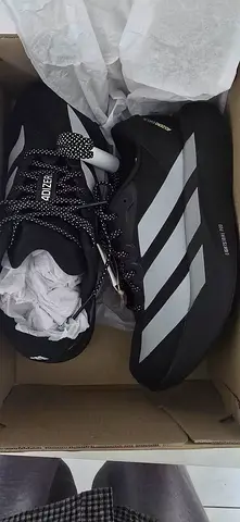 Adidas running shoes - black with white stripes, size available