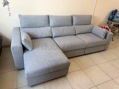 Eskilstuna L shape sofa bed with storage space