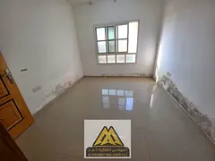 2BR in Al Rawda 2, balcony, central AC, family building, spacious, AED 34,997, 4 cheques.