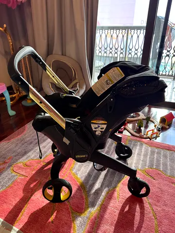 Doona + Doona Plus infant stroller/ car seat limited edition