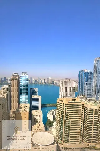 Apartment for Sale in Al Qasba, Sharjah | 2 Master Bedrooms | Private Parking | Great Value