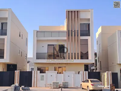 Villa for sale|ajman|al zahia area|6 master rooms, majlis,2 halls,maid room,roof|freehold|price included registration fees, and air conditioning.