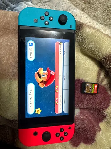 Nintendo Switch console MOD:-HAC-001(-01) with Super Mario game cartridge+mincraft game card