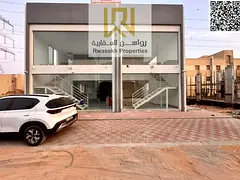 Commercial corner building G+1+Mezzanine ALYASMEEN AREA AJMAN LAND AREA :3100 sq.ft