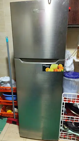 Used two-door stainless steel refrigerator - good working condition