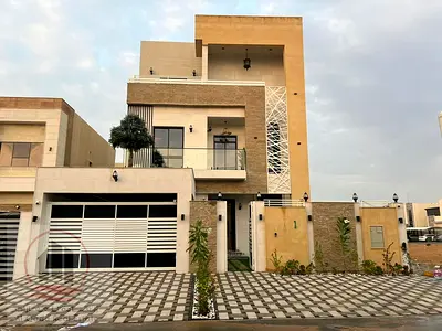 Villa for sale in Ajman, Al Helio area, 5 master bedrooms, a living room, a hall, and a maid's room