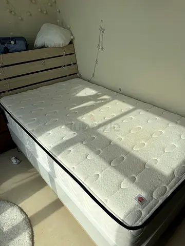 Single mattress Sirena in good condition - firm support. Along with bed base.
