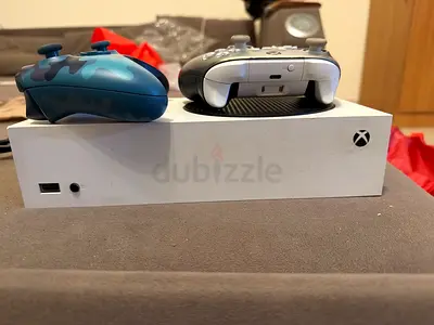 Xbox Series S console with two wireless controllers (good condition)