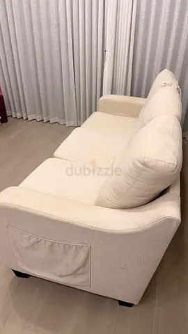 3-seater beige fabric sofa in good condition