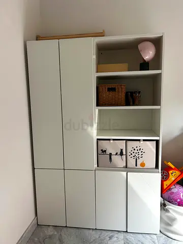 White modular storage cabinet with cubbies and drawers