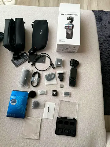 DJI Osmo Pocket 4 with Accessories — Gimbal Camera Kit (perfect Condition) with 2y warrenty