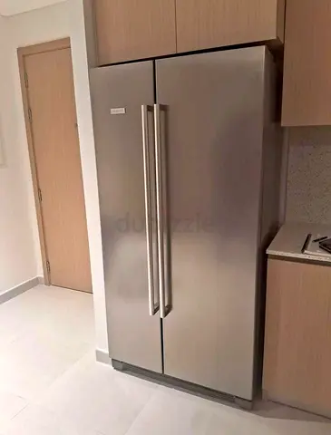 Stainless Steel Side-by-Side Refrigerator - Good Condition