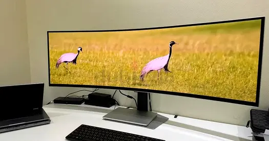 The Samsung Odyssey OLED G9 (G91SD) is a massive 49-inch ultrawide curved gaming monitor that featur