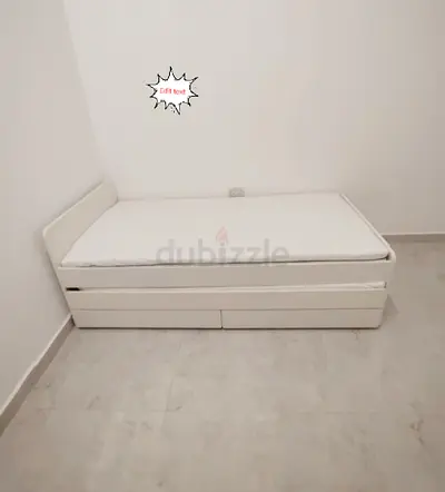 Ikea slakt bed frame with under bed and 2 storage drawers underneath with 2 Ikea mattresses