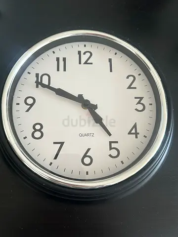 Like New Quartz Wall Clock with Black Frame (silent)!! Worth +100 aed