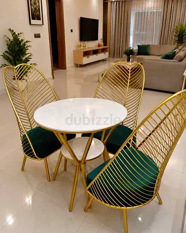 Gold Metal Dining Set with Marble Top Table and 3 Green Velvet Chairs