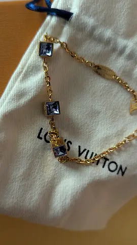 Gold-tone bracelet with square purple stones (pre-owned)
