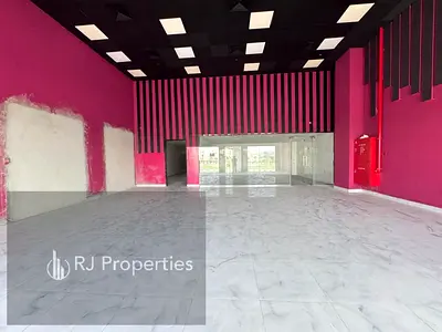 ON the road luxury showroom with MAZZiNE FLOOR 30 kw Electricity power with office space ready to move Easy Exit dubia Business center only jest 260k
