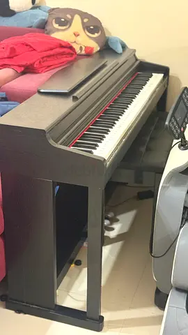 Used digital piano with stand and bench - good working condition