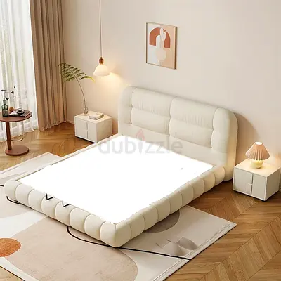 Modern upholstered queen bed with padded headboard - cream