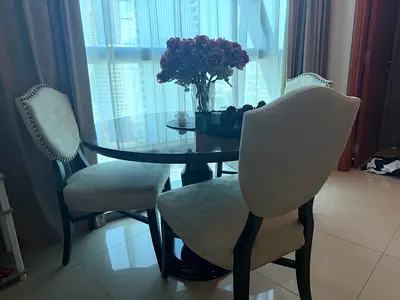 Round wood-top dining table with 3 upholstered chairs (set)