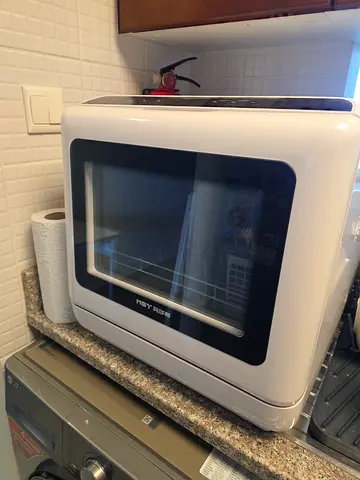 Compact countertop dishwasher - no plumbing required.