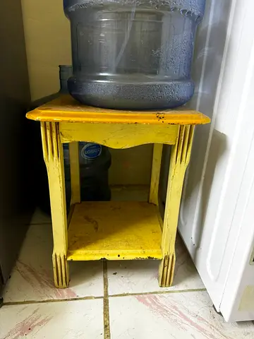 Small vintage yellow wooden side table / plant stand