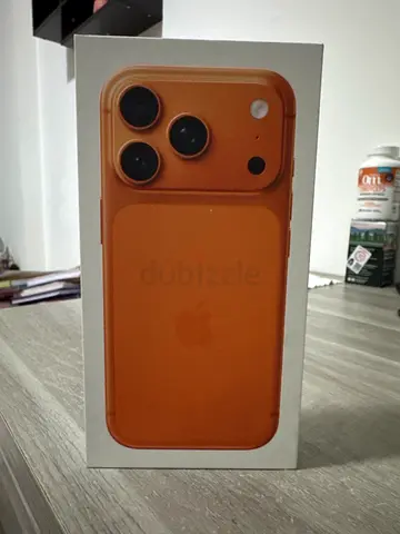 Apple iPhone 17 Pro (boxed) - Orange Swift Case shown 512 GB