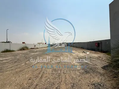 Yard for Rent in Al Sajaa on a Main Road with Complete Facilities